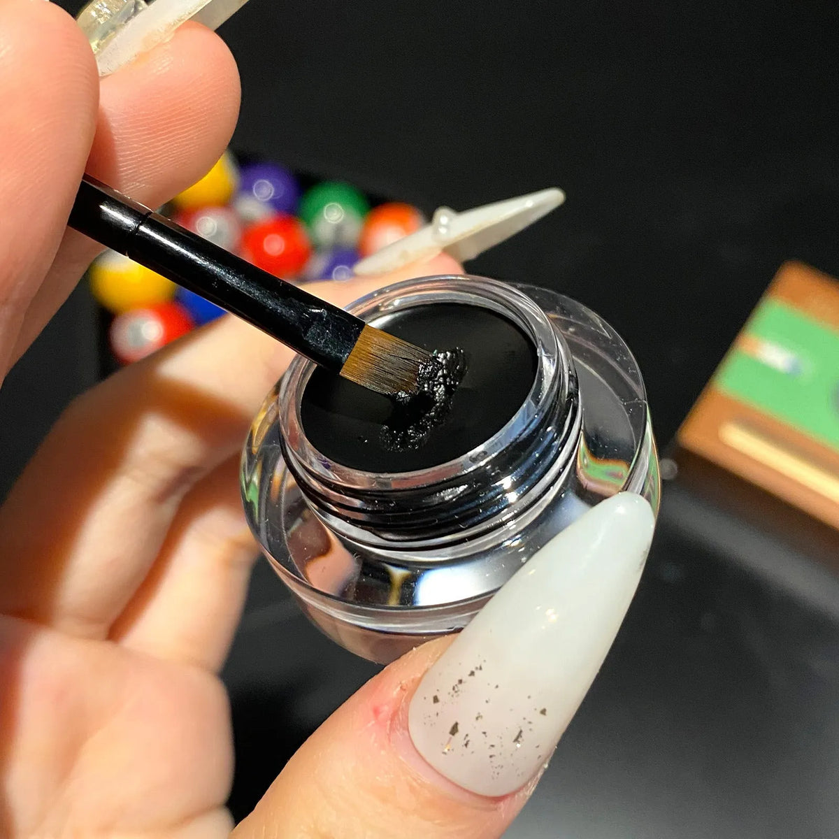 Eyeliner makeup set with mascara, eyeliner, and brush in black or brown, smudge-free and waterproof.