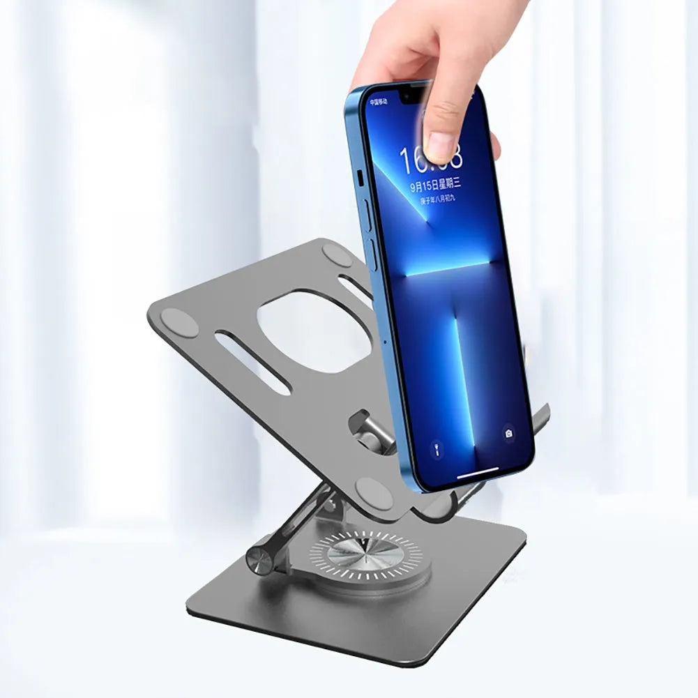 Rotating tablet stand in silver colour showing height adjustment and aluminium panel for device support