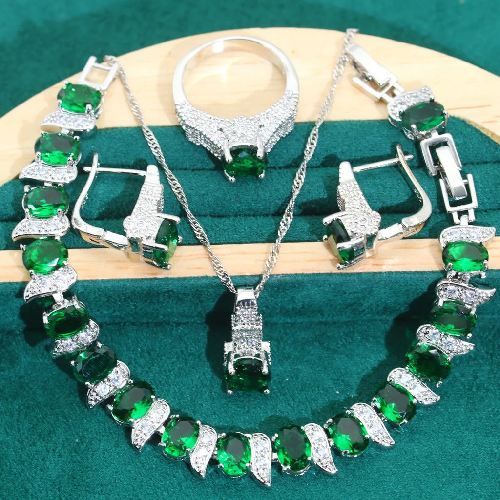 Four-piece bridal jewellery set with zircon chain necklace, bracelet, earrings and ring in alloy with water wave design