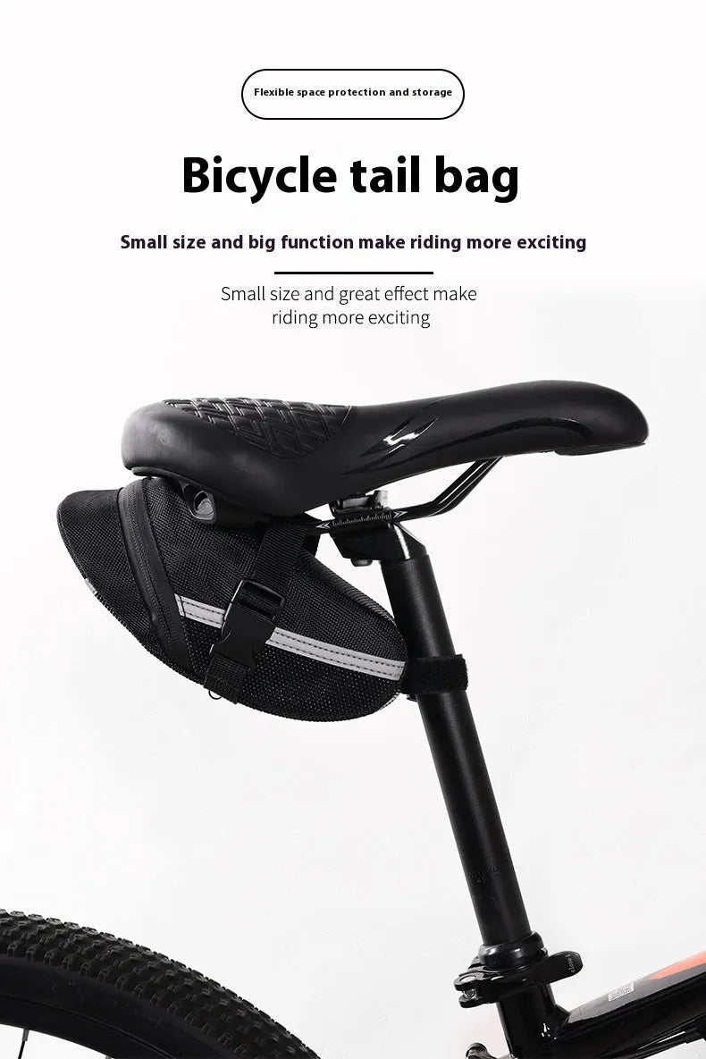 Black cycling tail bag mounted on mountain bike saddle with quick release fixture