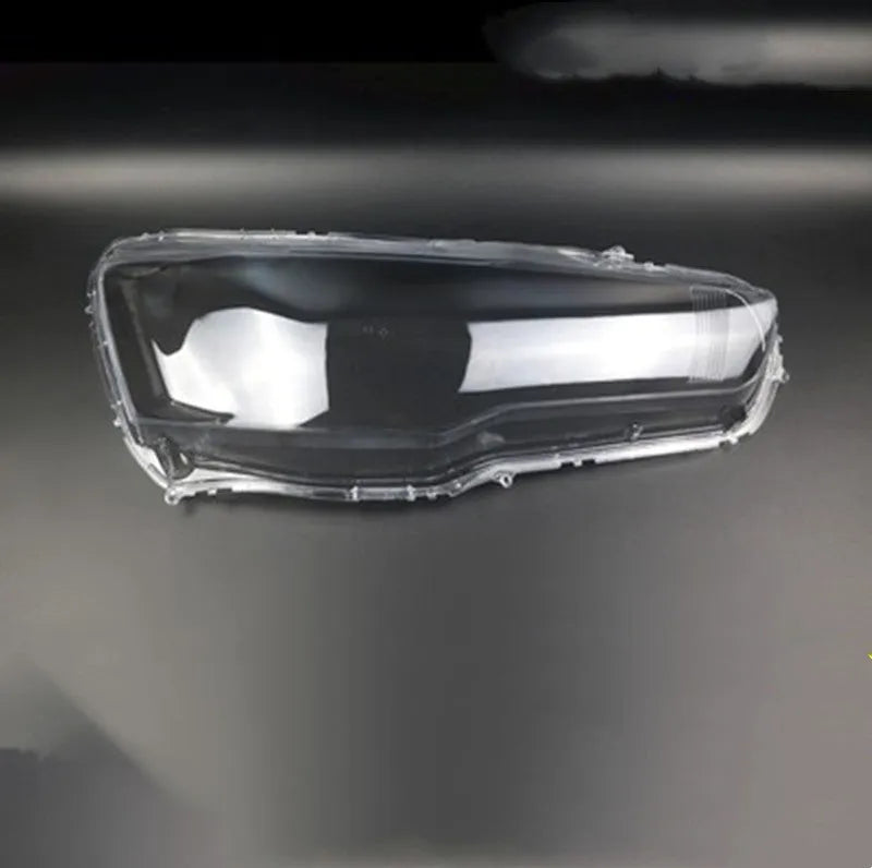 Transparent plastic car headlight housing cover showing clear construction and 50x30x20mm dimensions