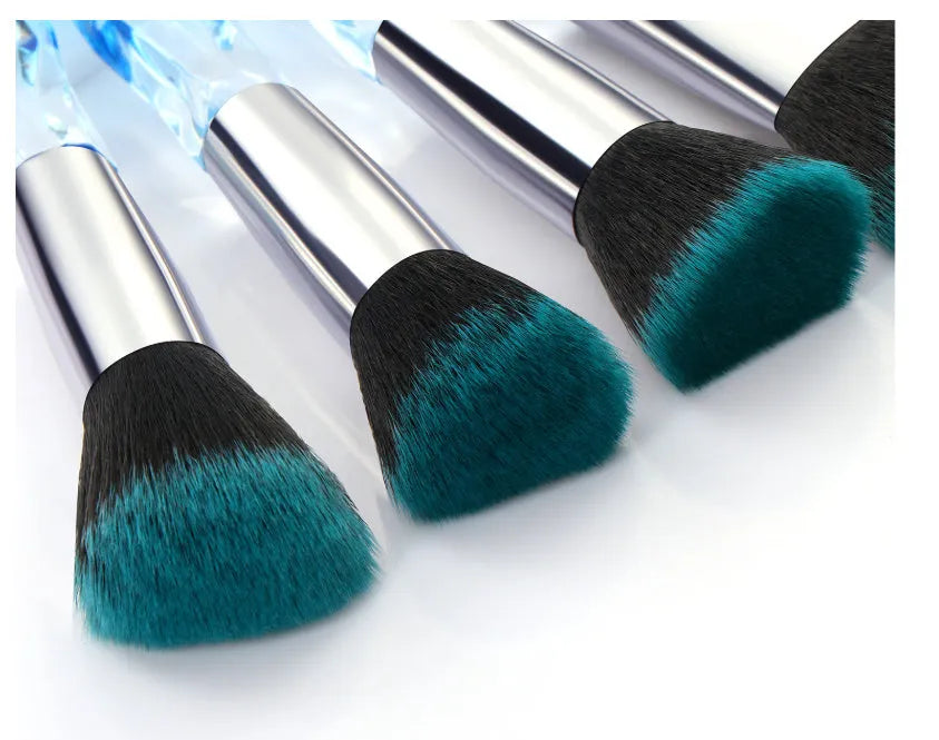 Set of ten clear crystal-handled foundation brushes with synthetic bristles in a choice of colours.