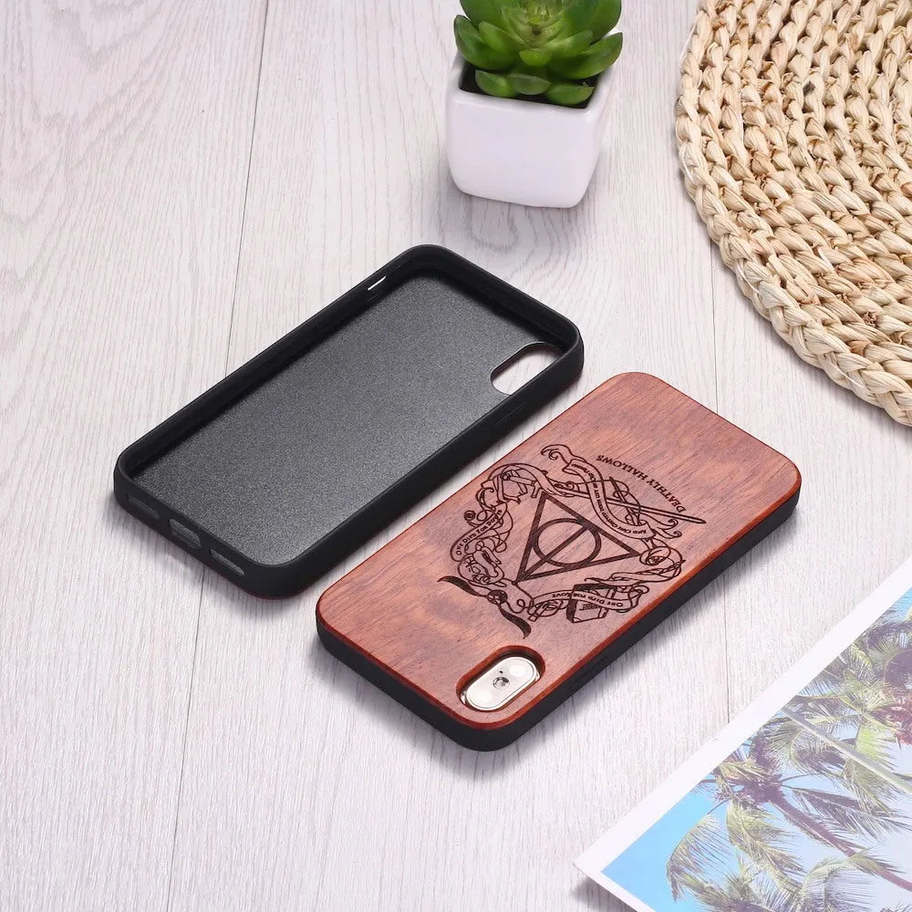 Wooden phone case with TPU bumper showing laser-carved pattern on wooden back