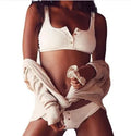 Women's solid colour bikini set with push up padded bra in black, blue, and white available in sizes S M L XL
