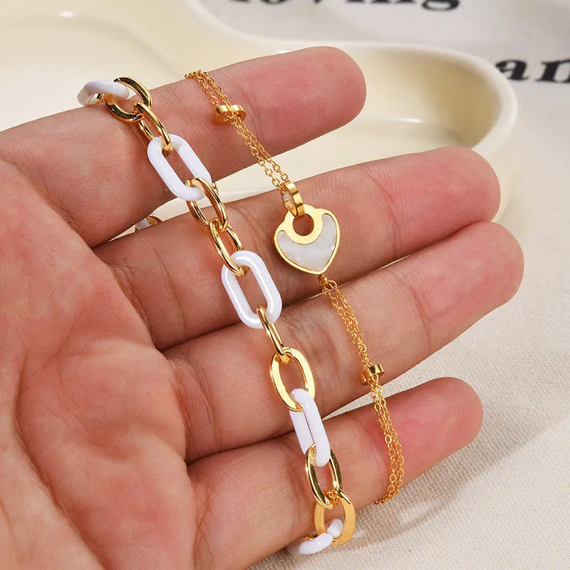 Women's stainless steel resin bracelet with double layer loving heart design and electroplated finish