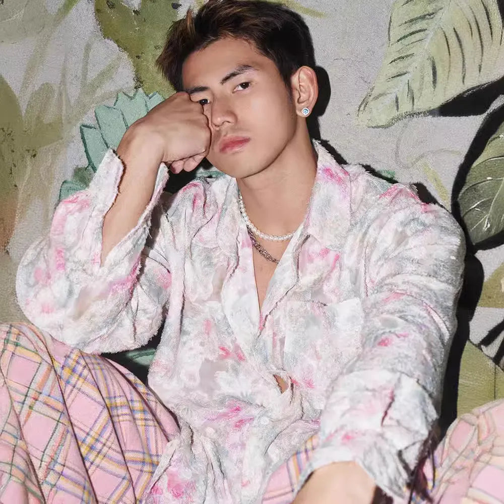 Men's pink floral long sleeve shirt with embossed pattern and loose fit.