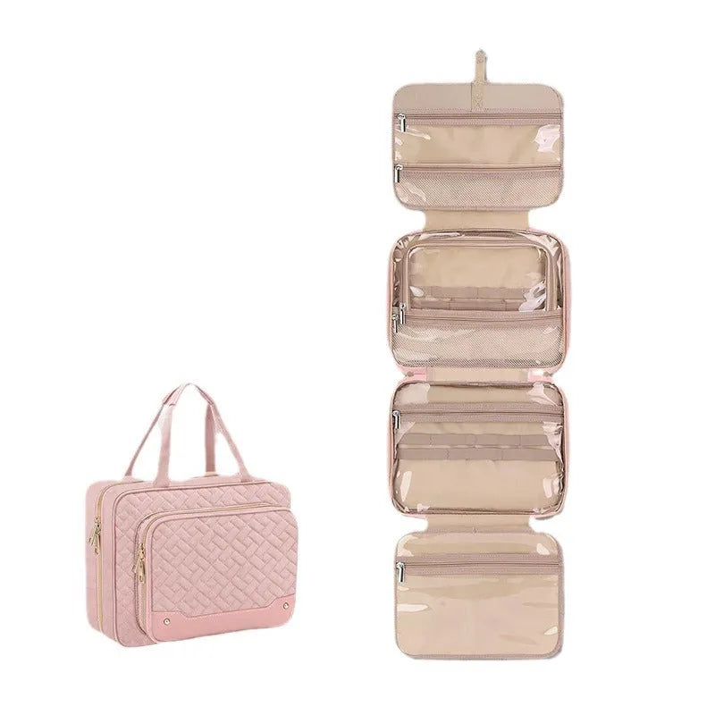 Pink waterproof hanging cosmetic bag with dimensions 30.5 cm wide shown suspended from a hook