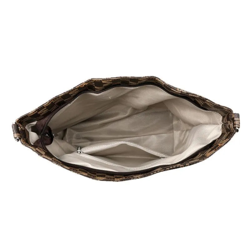 PU leather dumpling shape shoulder bag with sandwich pockets and zippered compartment