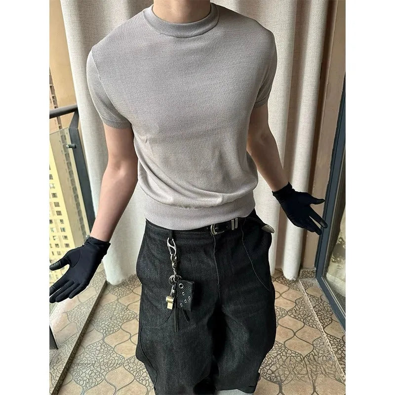 Men's slim fit short sleeve polyester T-shirt showing cuff-closing thread detail in solid colour option.