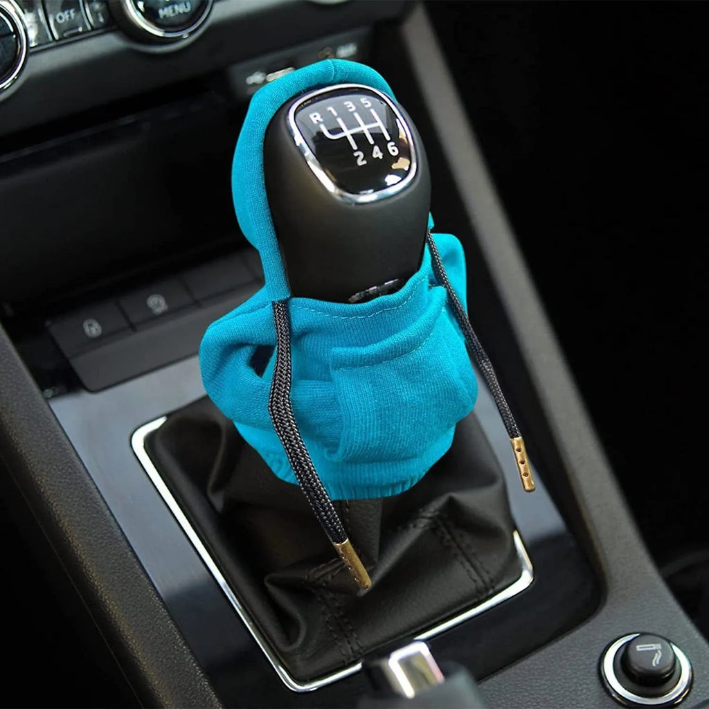 Blue cloth gear shift knob cover measuring 13 by 8 centimetres for car gear lever