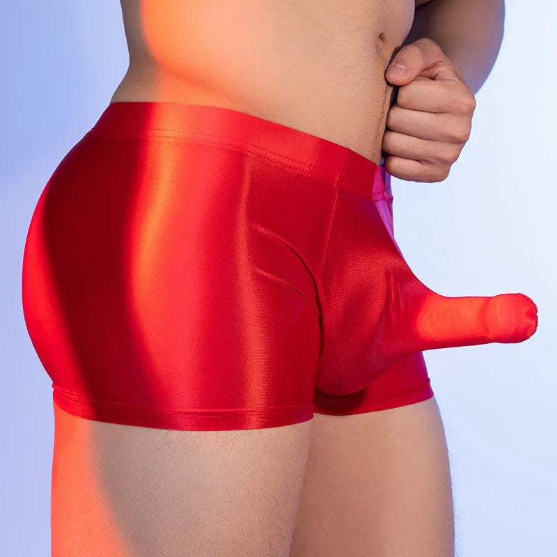 Men's seamless nylon boxer shorts in red with an elephant nose animal year print, showing mid waist fit.