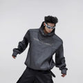 Men's loose red hooded sweater with heavy shoulder pads and a metallic 3D printed design on the front.
