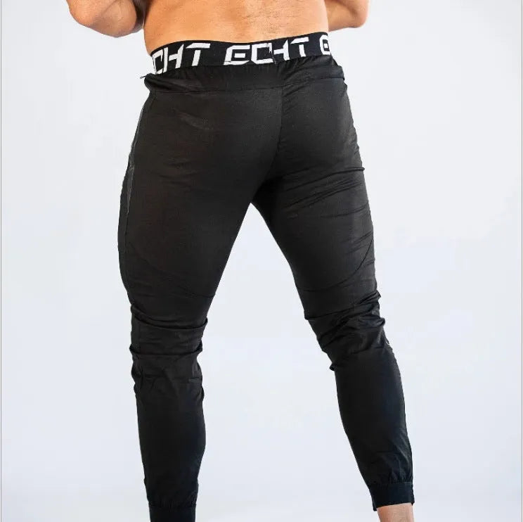Men's cotton fitness sweatpants in black, grey, and navy blue for running and gym
