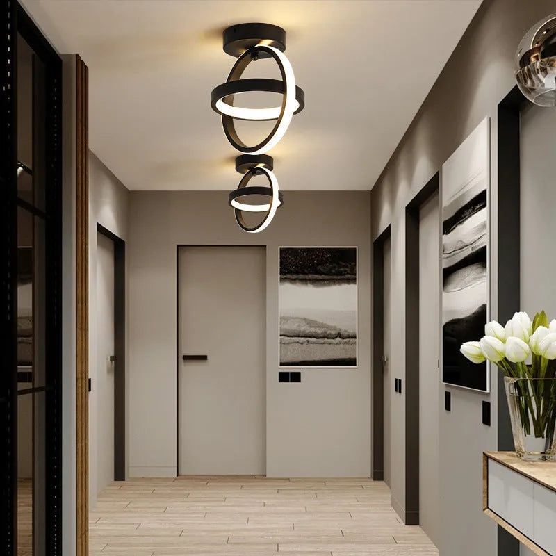 Modern round ceiling light with black finish and white acrylic shade, 21cm diameter.
