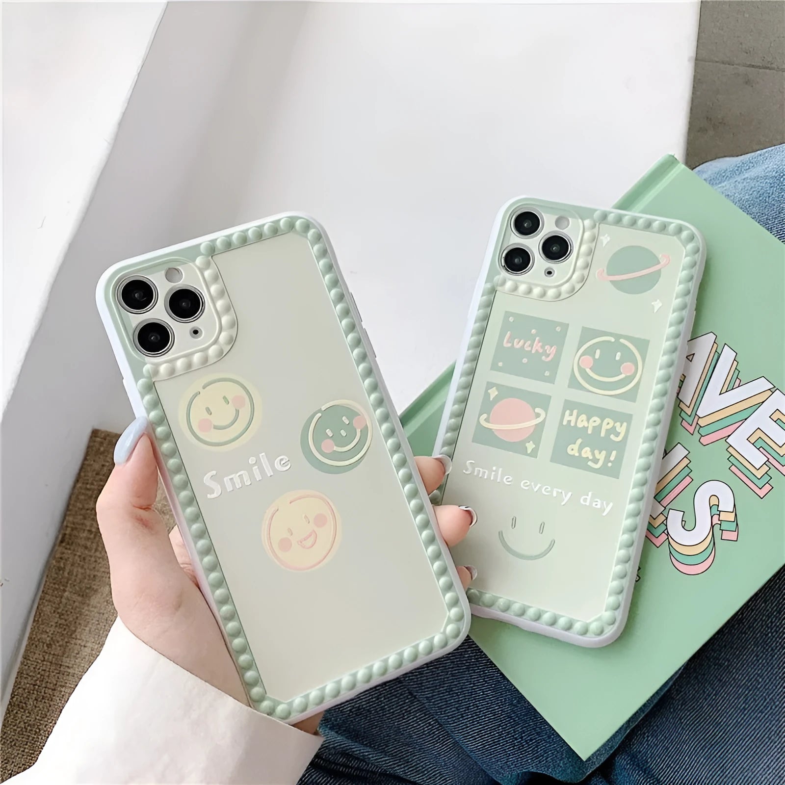 Green soft rubber TPU iPhone case with geometric pattern and smiley face polka dot frame design.