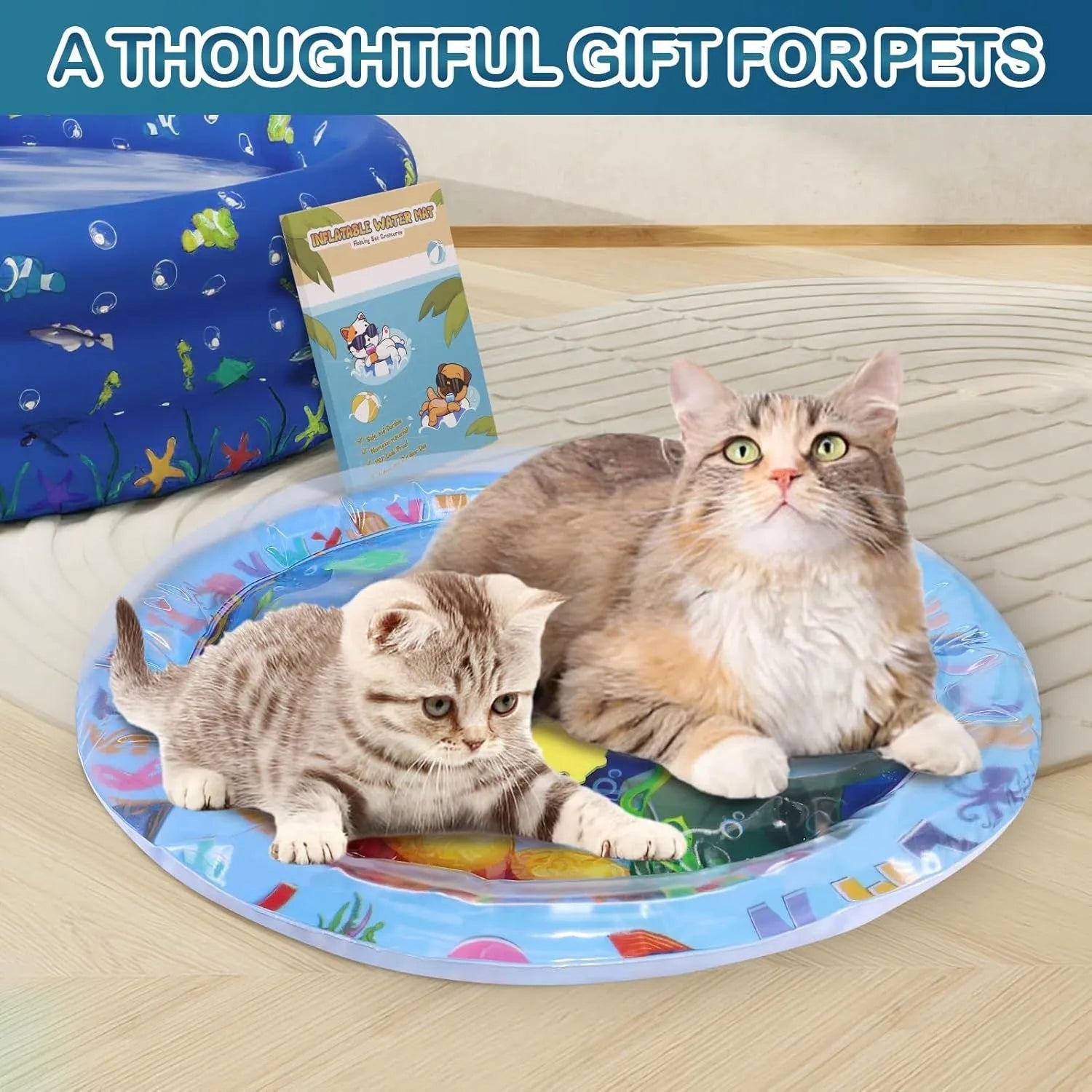 Square blue water sensory playmat for cats and dogs with ocean fish design and floating toys inside.