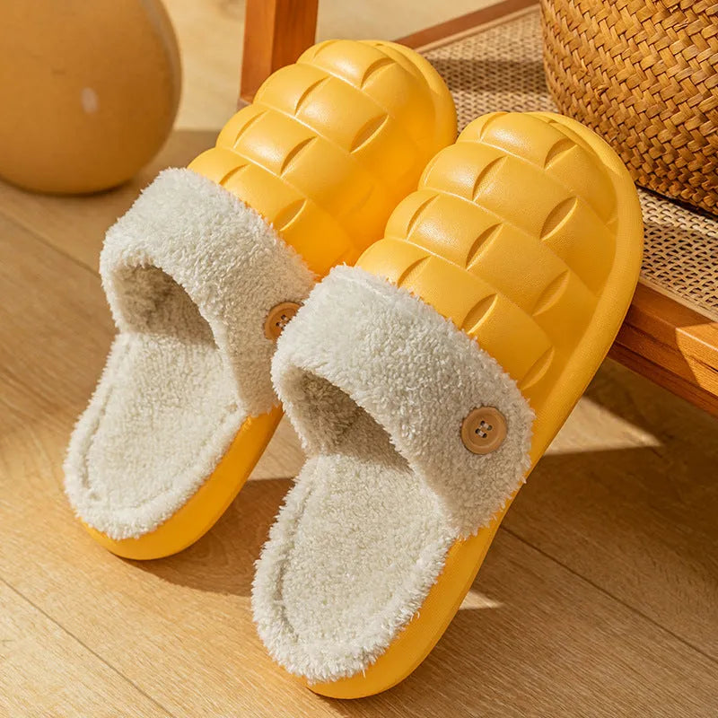 Plaid-patterned detachable women's house slippers with a plush lining and a light-coloured EVA sole.