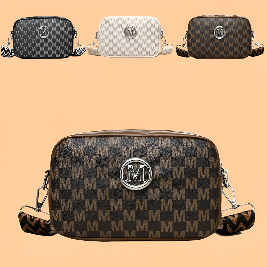 Crossbody bag with wide shoulder strap in black colour showing three-dimensional pocket construction