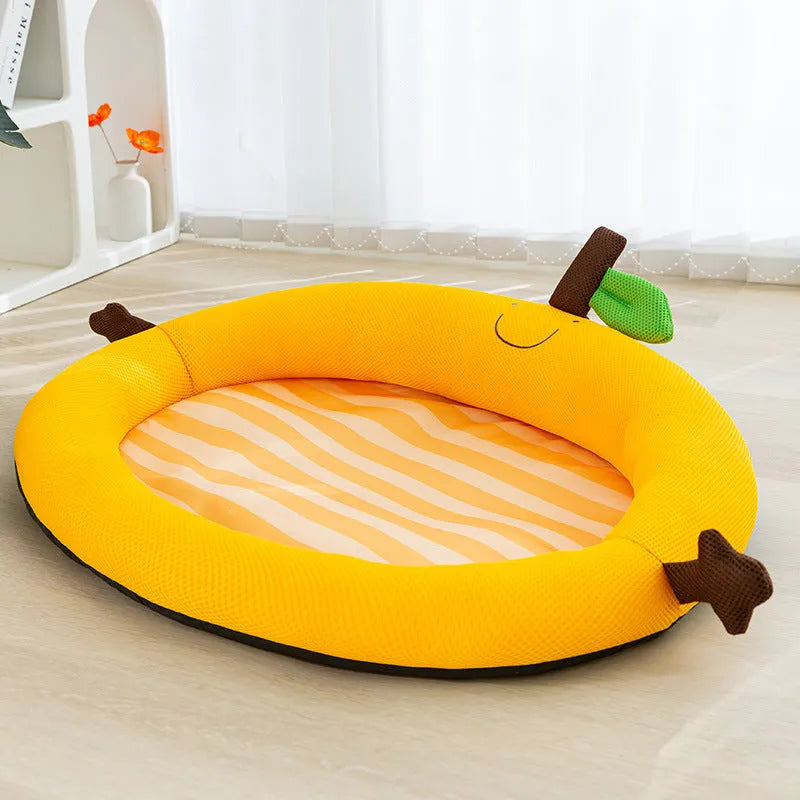 Green fruit backrest pet nest mat for dog or cat on floor.