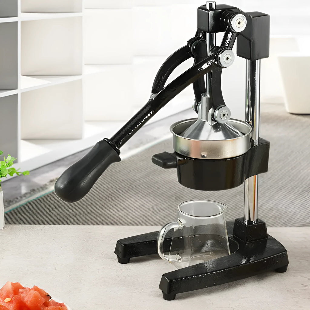 Black or white cast iron manual citrus juicer with stainless steel funnel and 40cm height