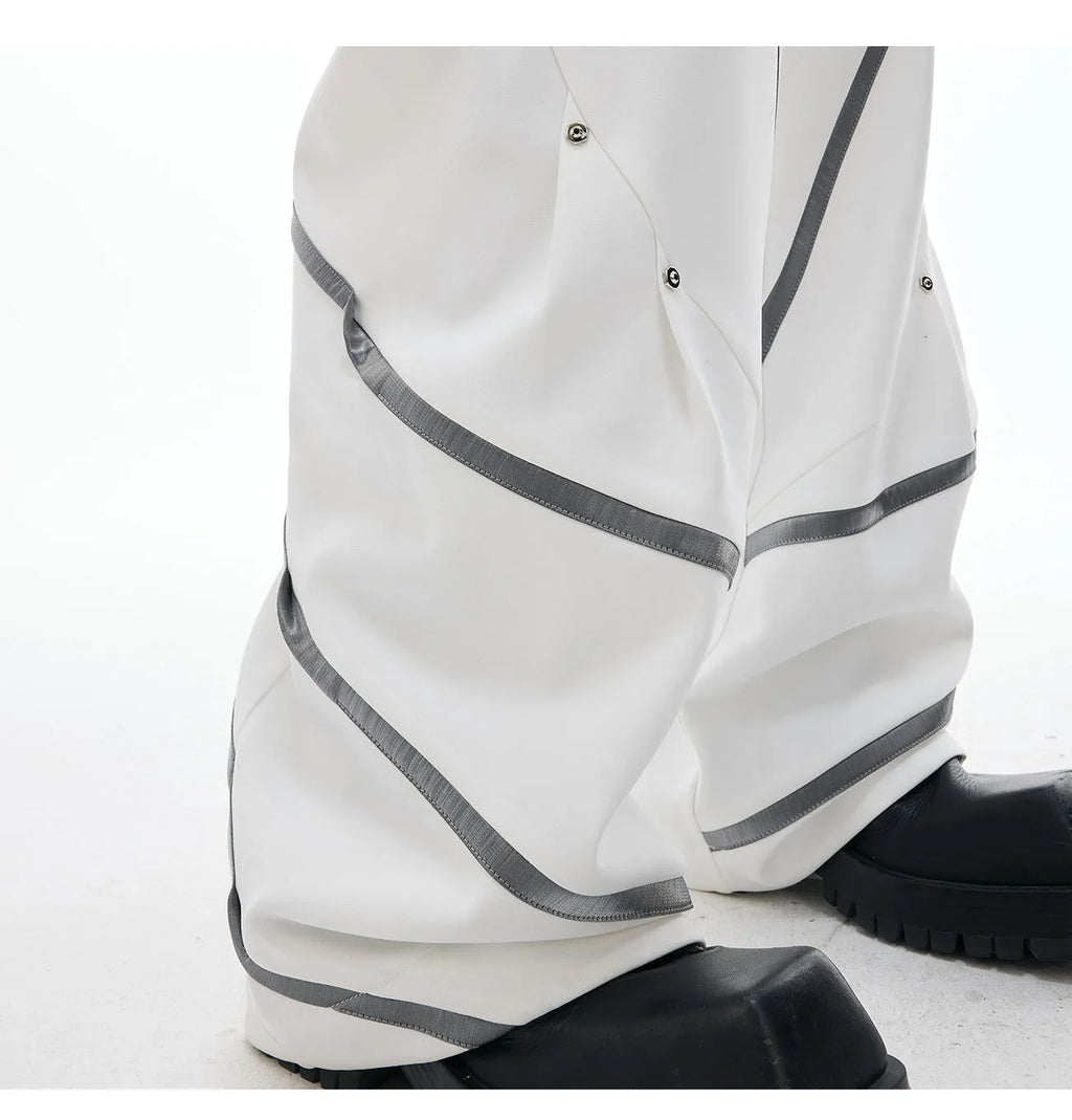 Men's trousers with three-dimensional cutting and metal striped rivet pleated detailing