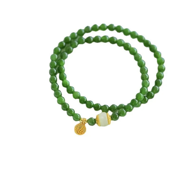 Double circle Hetian jade bracelet with geometric design and fu character elements