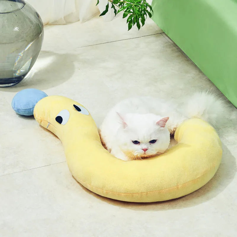 Blue rectangular pet pillow for cats and dogs on a floor, showing its 62cm by 39cm size.
