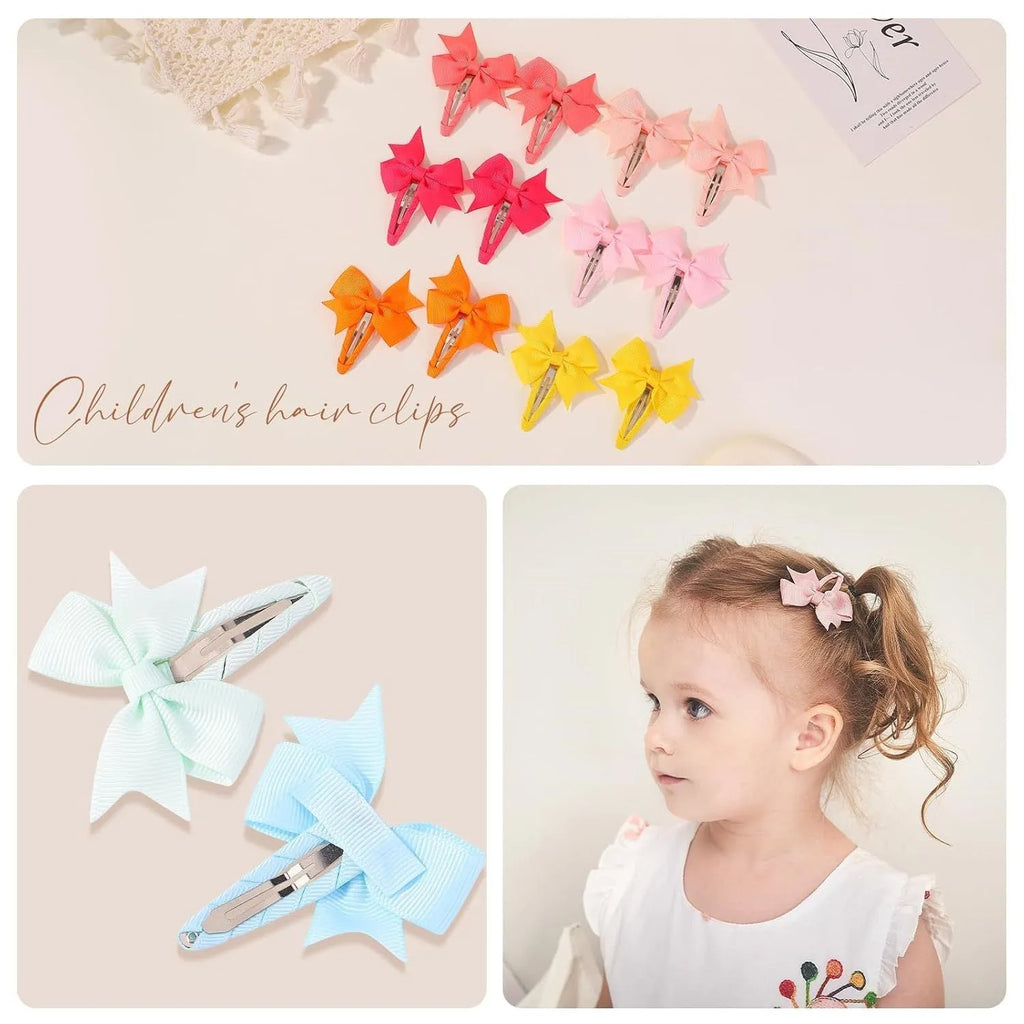 40-piece set of multicoloured grosgrain ribbon baby hair bows with fully wrapped snap clips.