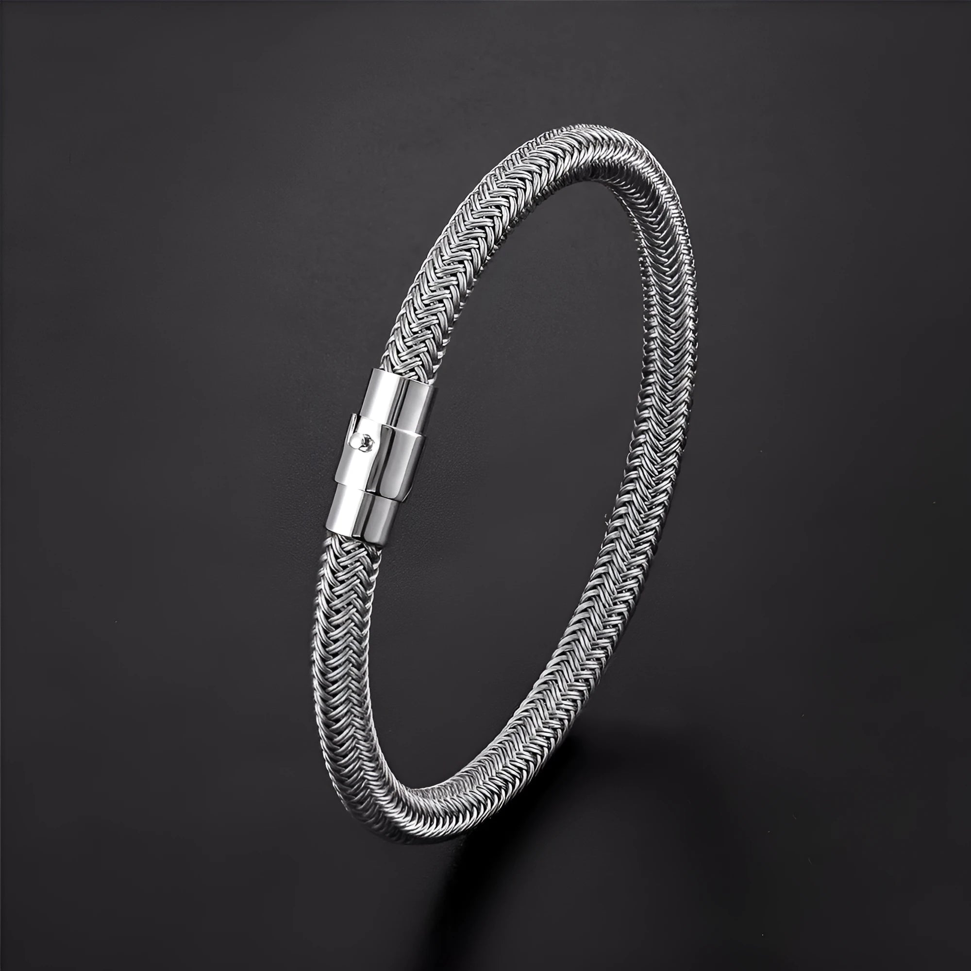 Men's titanium steel geometric wire bracelet with a magnetic clasp in black, shown on a wrist.