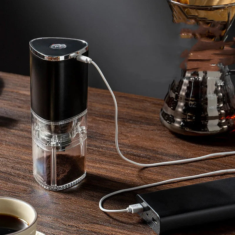 Portable USB rechargeable electric coffee grinder in black or white with ceramic burr.
