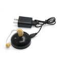 Black silicone rechargeable hearing aid amplifier with USB charging cable for the elderly.