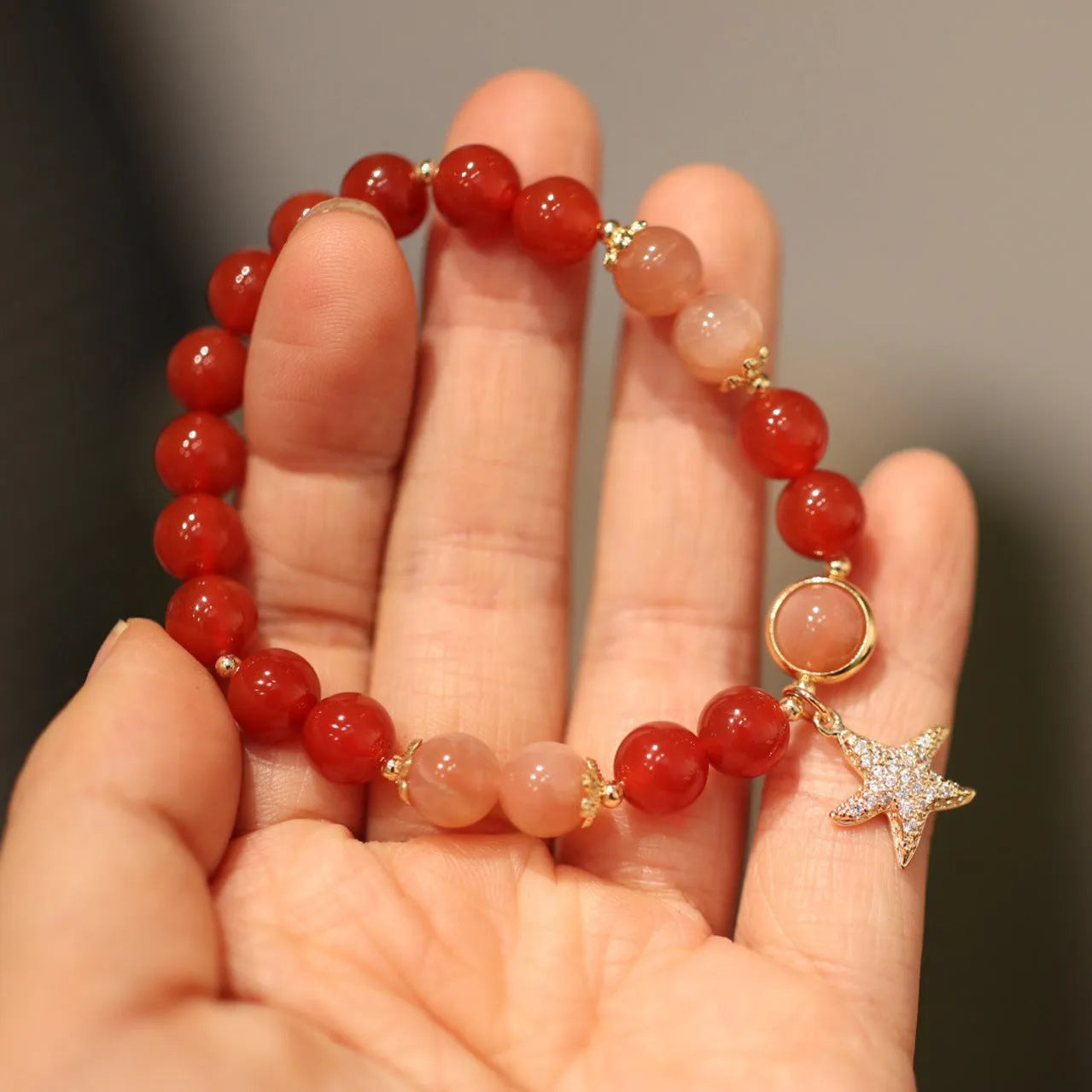 Handmade red agate bracelet with 8mm sands orange sunstone beads and star xiangyun ethnic design