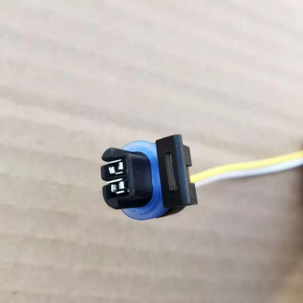 ACDelco brand water temperature sensor plug for automotive coolant system replacement.