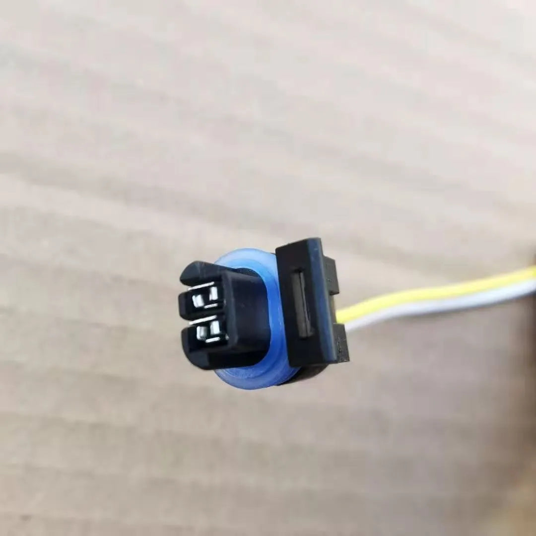 ACDelco brand water temperature sensor plug for automotive coolant system replacement.