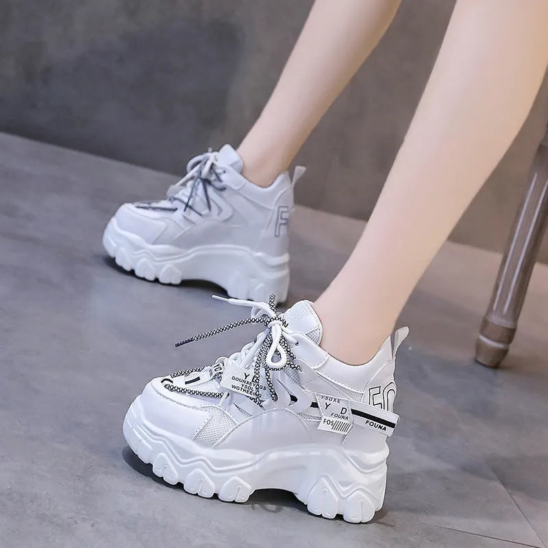 Women's white breathable mesh platform sports shoes with cross strap and 6-8 cm heel.