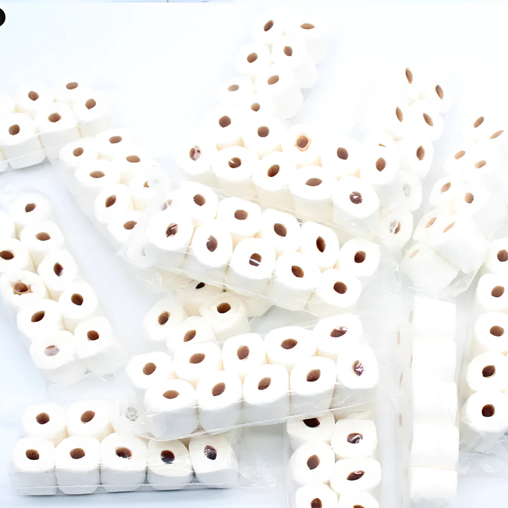 Miniature paper model of a tissue roll for children's play, measuring 30mm by 15mm by 80mm.
