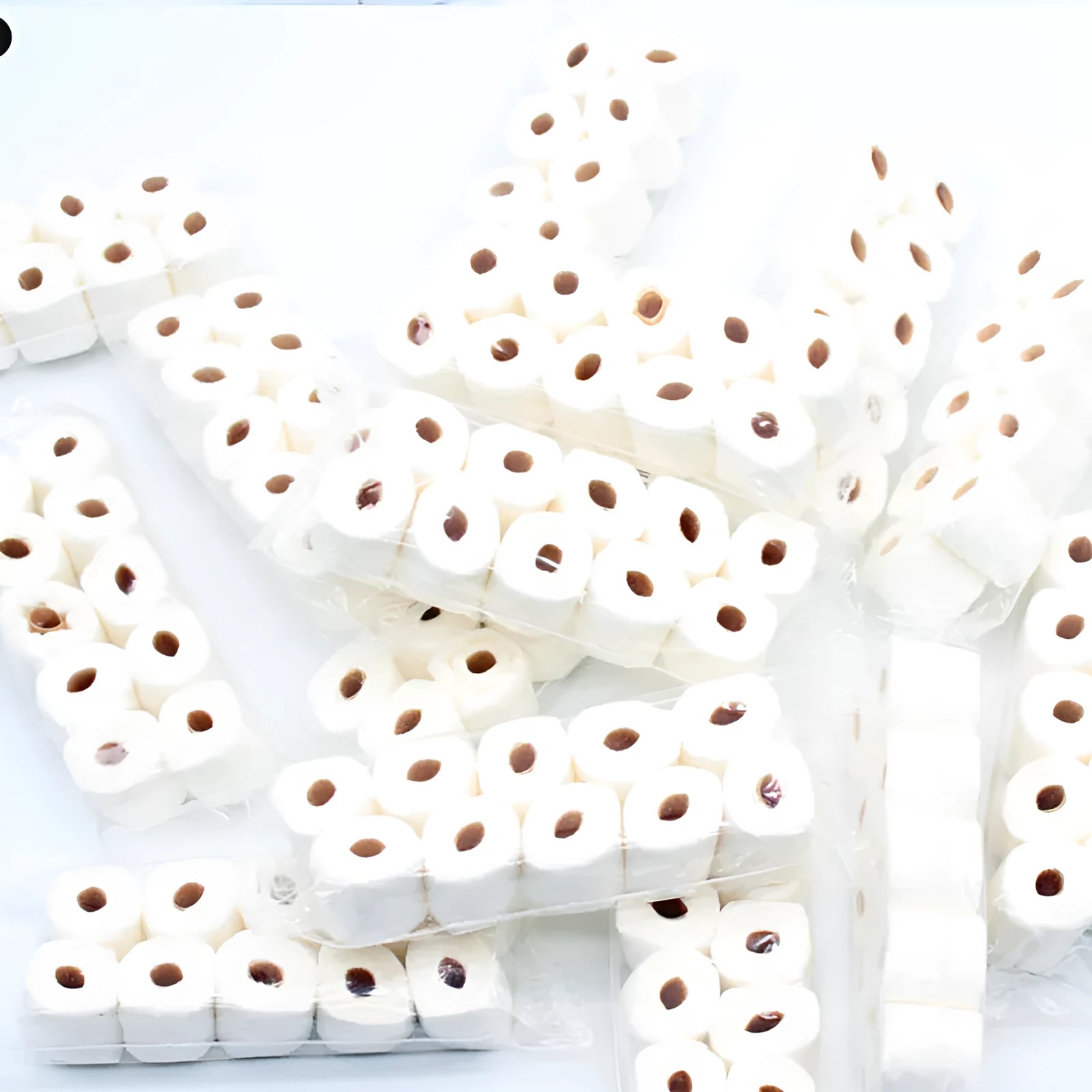 Miniature paper model of a tissue roll for children's play, measuring 30mm by 15mm by 80mm.