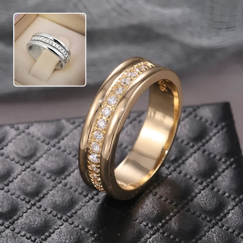Gold plated geometric rhinestone ring with inlaid stone on white background, size options