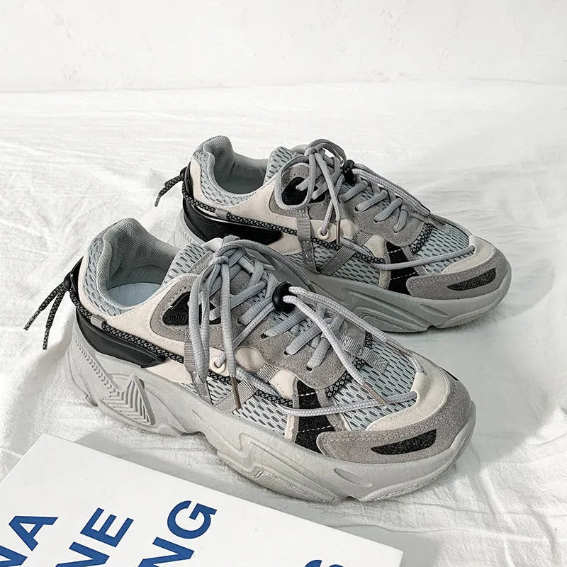 Men's white Korean-style platform dad shoes with lace-up front and thick sole.