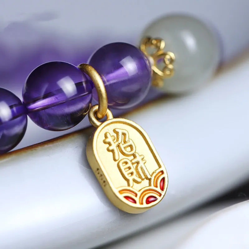 Women's amethyst bracelet with 8mm crystal beads in a geometric, national style design.
