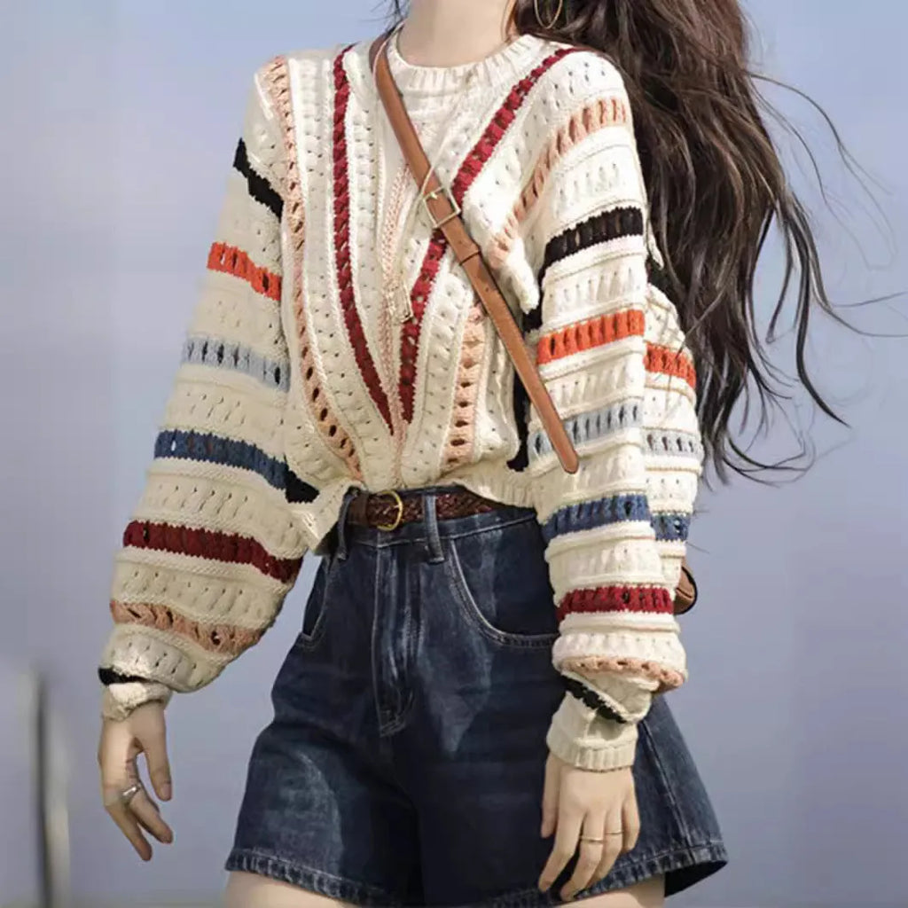 Rainbow striped hollow knit sweater with batwing sleeves in retro chic design