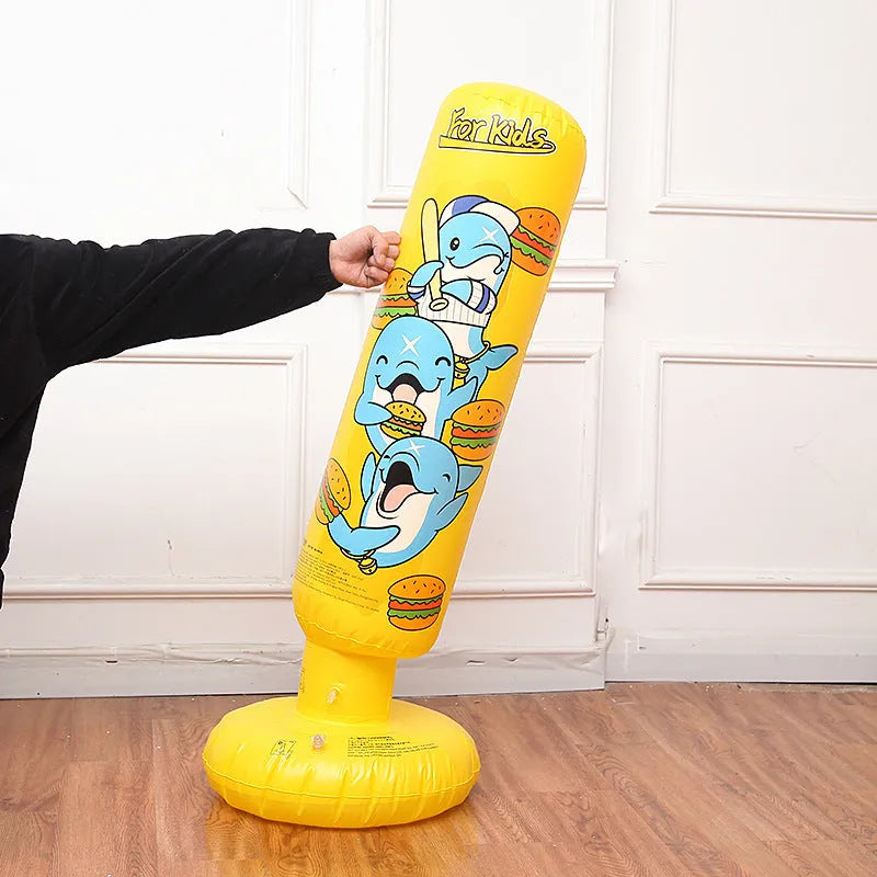 Yellow inflatable boxing column with hamburger print design standing upright.