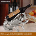 Lobster-shaped wine rack ornament in rose gold or silver resin for decorative bottle display.