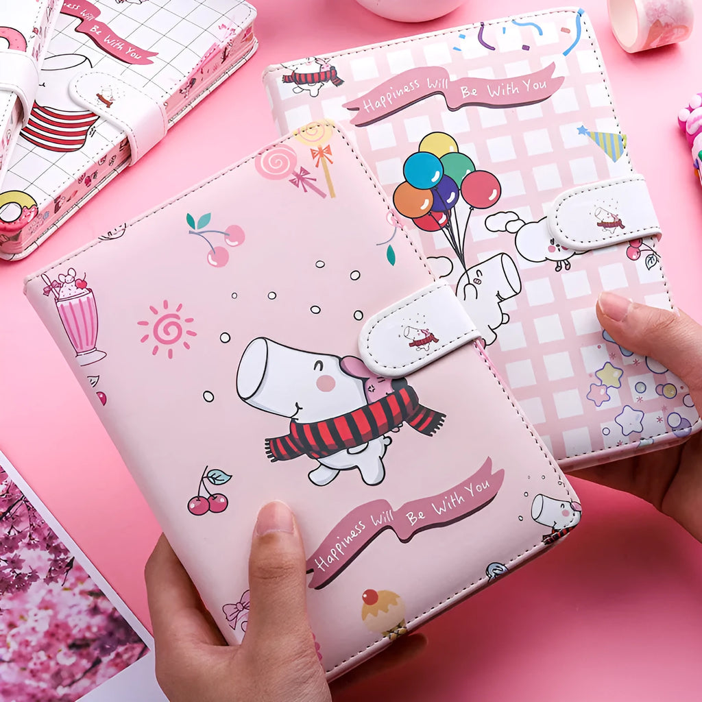 White portable notebook with magnetic buckle showing Kaba bear hippo and heart design