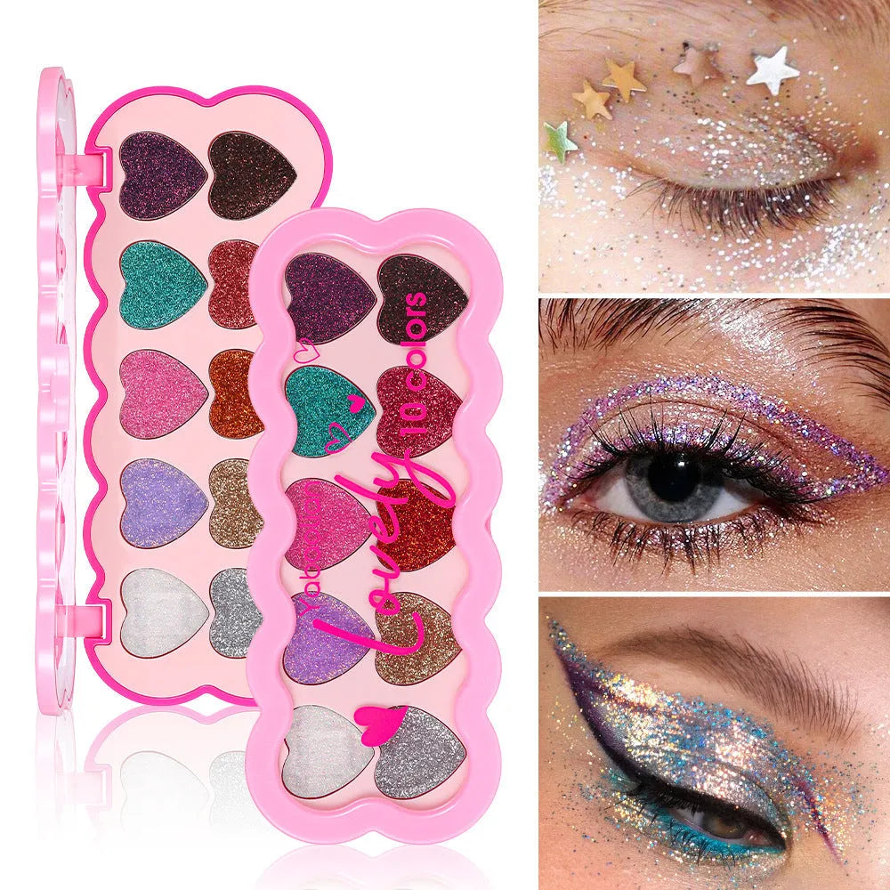 Heart-shaped compact open to show ten pans of pearlescent sequin eyeshadow in various colours.