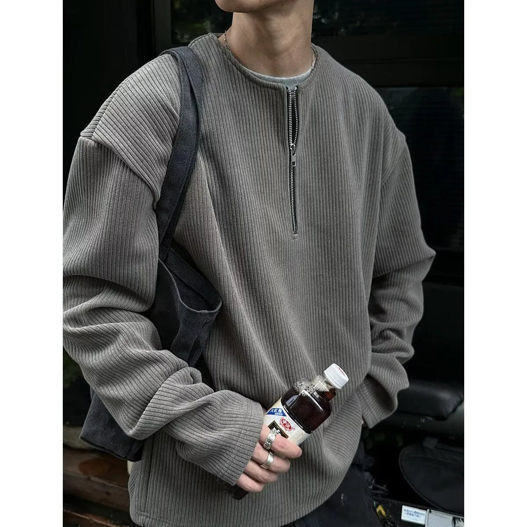 Women's solid colour loose long sleeve pullover top in grey, black, or apricot with letter pattern.