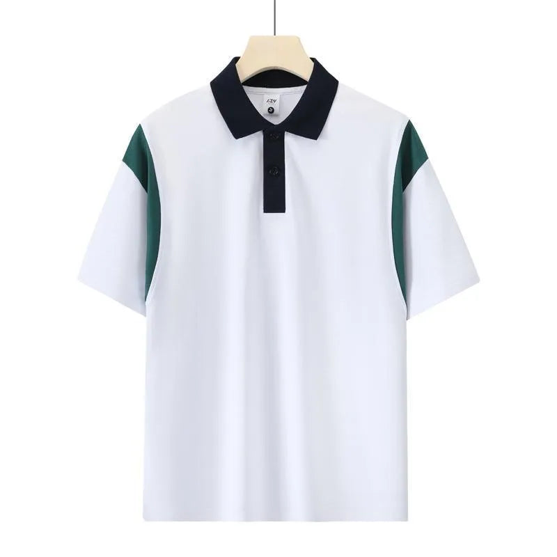 Man wearing a dark green combed cotton raglan short sleeve shirt with a loose fit.