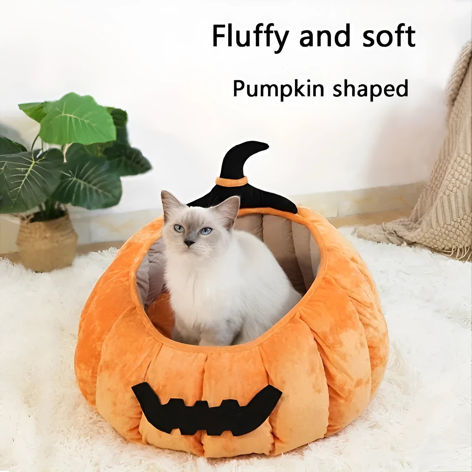 Orange Halloween pumpkin-shaped soft plush cat bed with a cartoon devil face design.