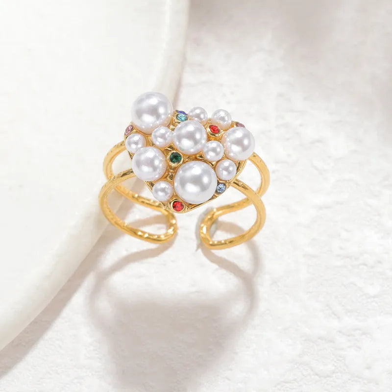 Women's stainless steel open mouth ring with pearl and zircon detailing in round and heart-shaped styles