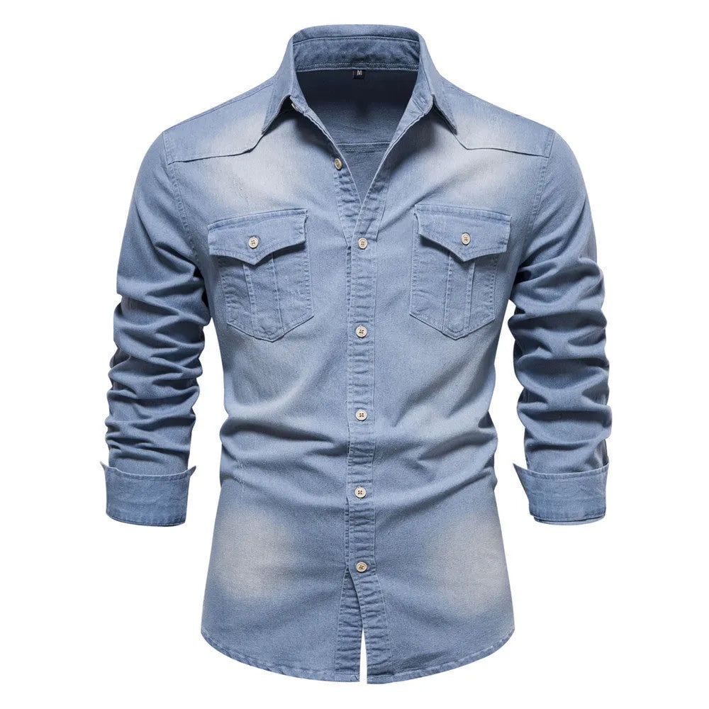 Men's slim fit long-sleeved denim shirt buttoned down in a solid blue colour.